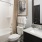 a bathroom with a sink toilet and a shower
