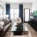 a living room with a tv and couches