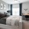 a bedroom with a bed and desk